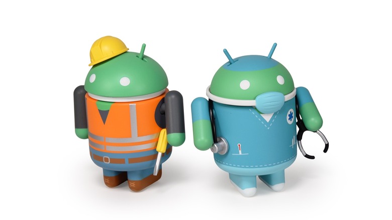 Dead Zebra android blind box figures dressed as construction worker and doctor in front of white background