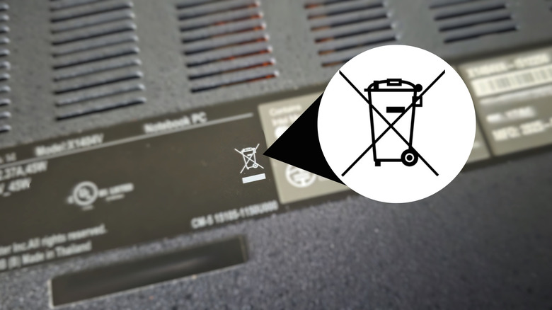 WEEE trash can icon with x on bottom of laptop and electronics.