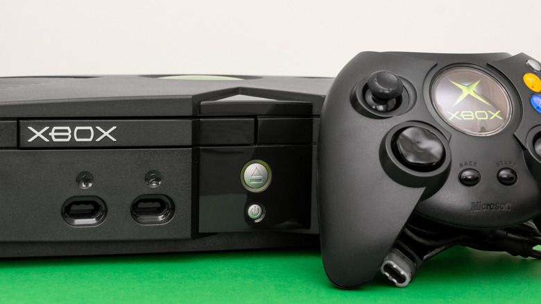 An original Xbox and controller.