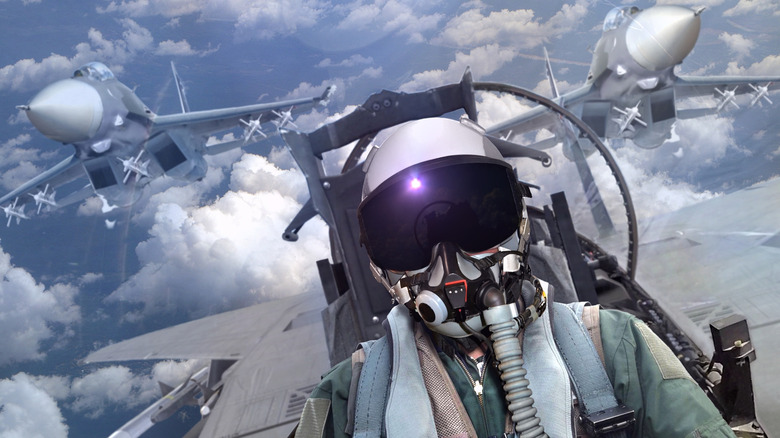Fighter pilot in cockpit with wingman support