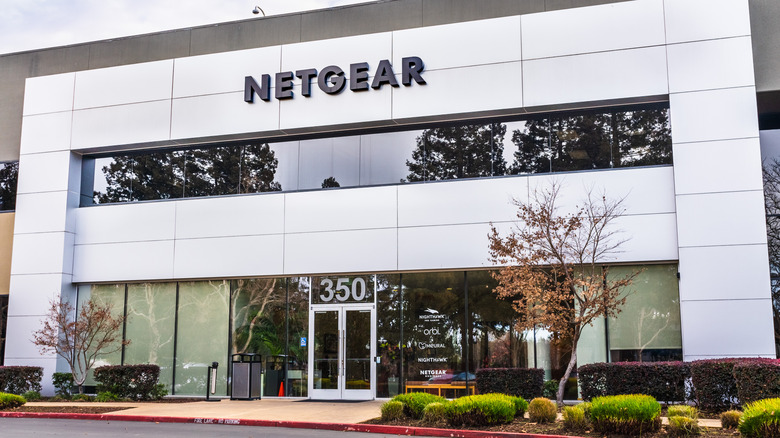 The front of an office building showing the Netgear logo.