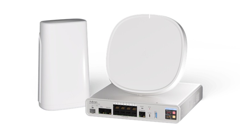 Adtran Inc SDG 9000 series service delivery gateway router in front of a white background