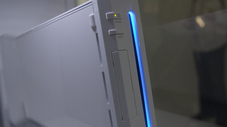 Close up of Nintendo Wii with blue light on