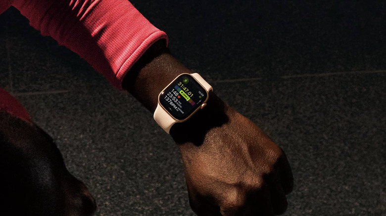 A person wearing an Apple Watch Series 11.