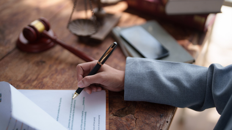lawyer working on paperwork and regulations
