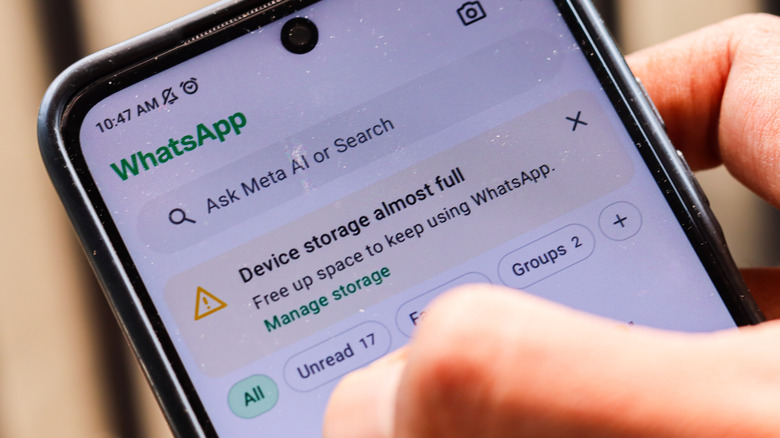 WhatsApp notifies a user when their phone's storage is almost full.