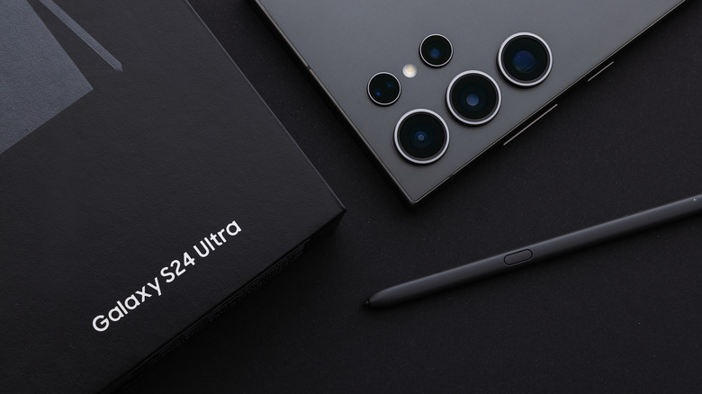 A Samsung Galaxy S24 Ultra smartphone with a product box and S Pen