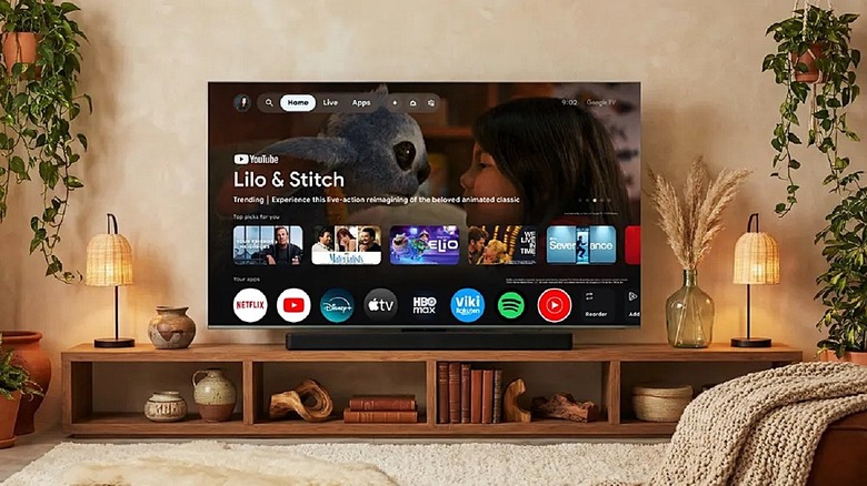 Google TV with smart entertainment menu on TV in living room.