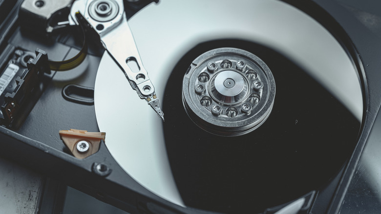 The disk and read/write head in an HDD.