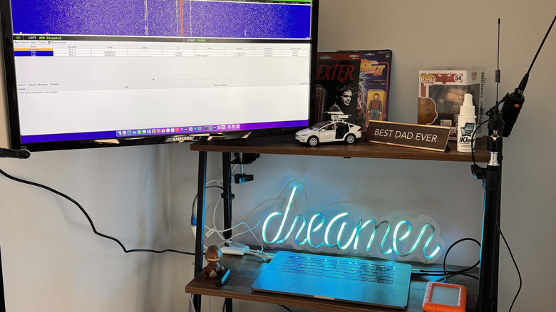 Bottom-half of a MacBook connected to a TV