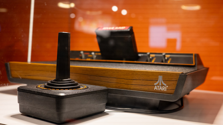 An Atari 2600 console with joystick on display