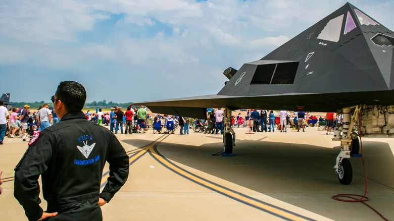 F-117 Nighthawk jet with crowds around it