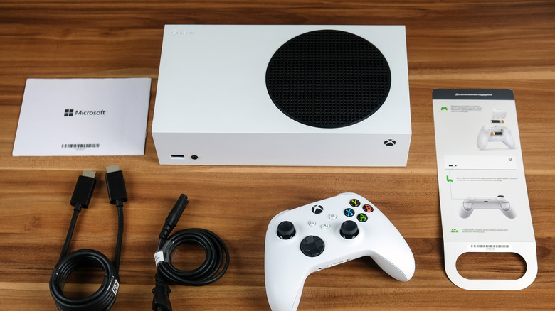 An Xbox Series S console and its accessories.