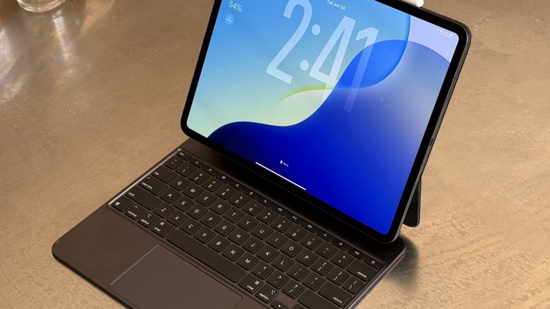 An iPad Pro attached to a Magic Keyboard