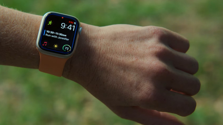 An Apple Watch displaying the blue border associated with AssistiveTouch