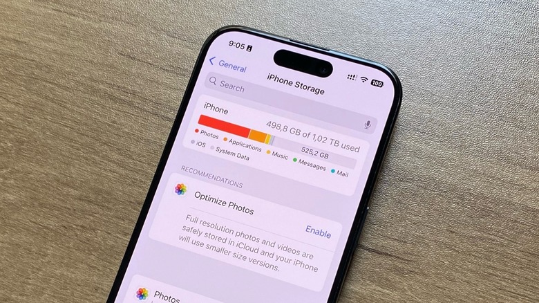 An iPhone on a table displaying how much storage it has available