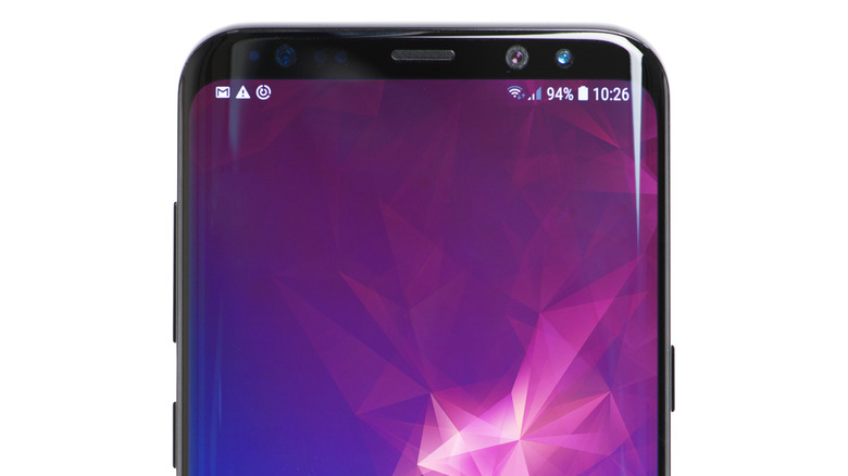 The Galaxy S8+: A close-up of the top bezel containing the selfie camera and various sensors.