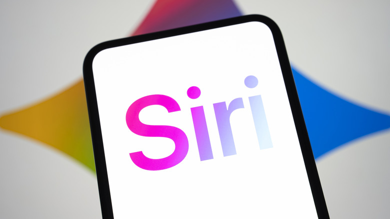 The Siri logo on a smartphone