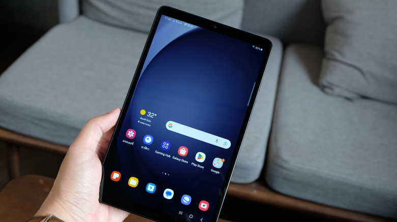 Person holding a Samsung Galaxy Tab A9