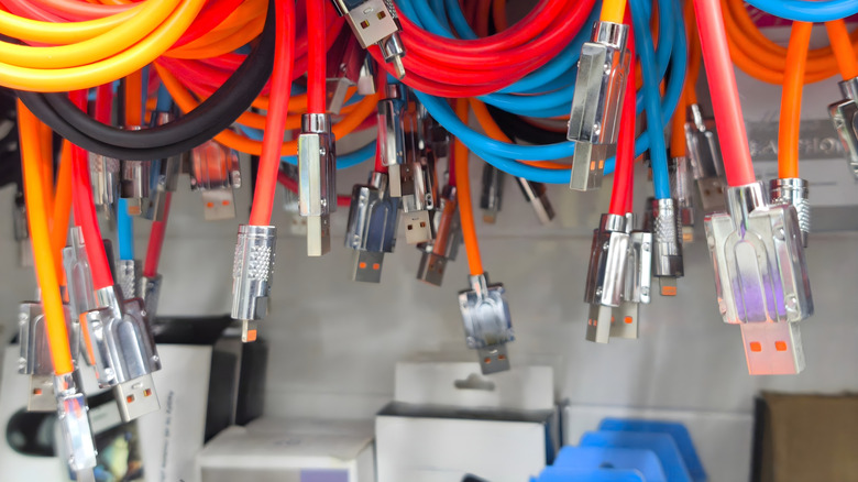 A number of dangling USB cables