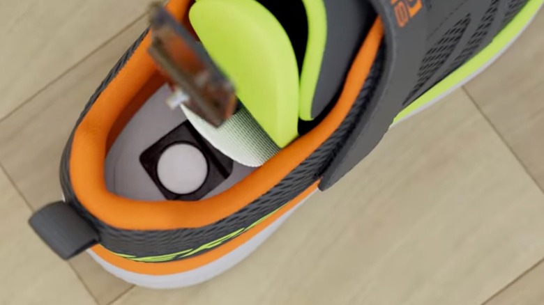 Shoes with a hidden AirTag compartment
