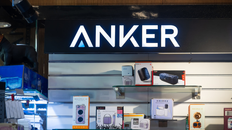 An Anker retail display with a selection of chargers and other accessories.
