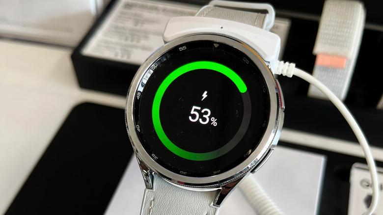 close-up galaxy watch while it is charging