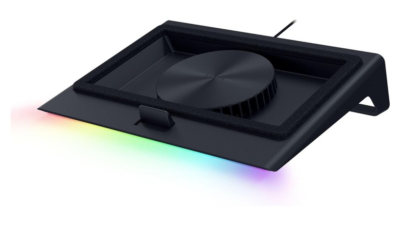 RGB-lit laptop cooling pad with integrated central fan and foam seal.