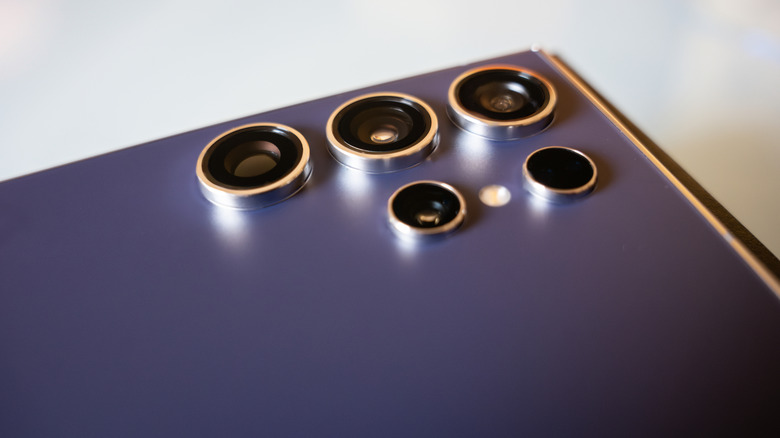 Close-up of the camera lenses on a Samsung S24 smartphone.