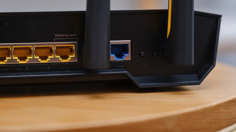 back side of the Asus TUF gaming ax3000 router with mutlple LAN ports, including a gaming port