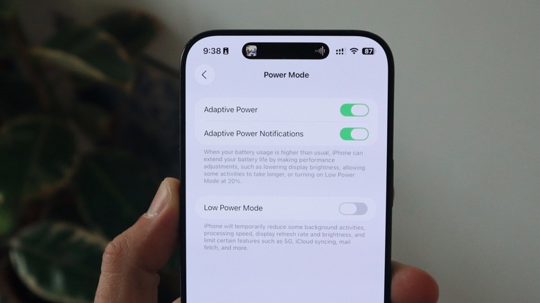 A person holding an iPhone