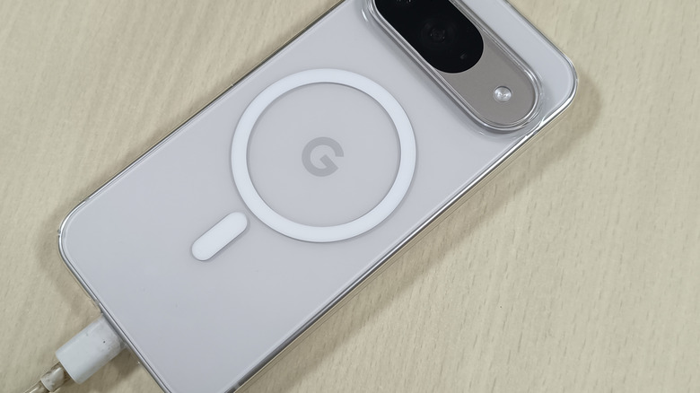 A Google Pixel 6 phone plugged in and charging