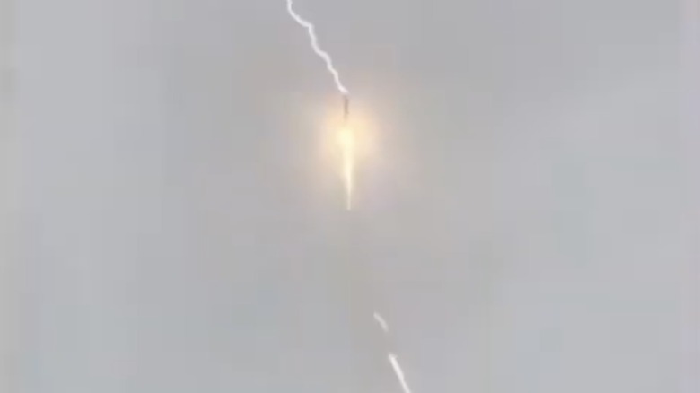 A Russian Soyuz-2.1b rocket being struck by lightning during a launch in May 2019.