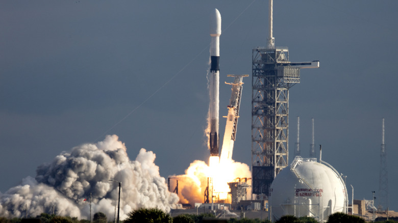 A SpaceX Falcon 9 rocket heading to space.