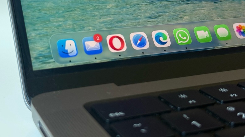 macOS Tahoe new Liquid Glass design running on MacBook Pro