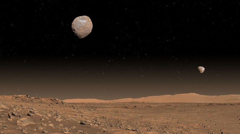 Surface of Mars with Martian moons in the background