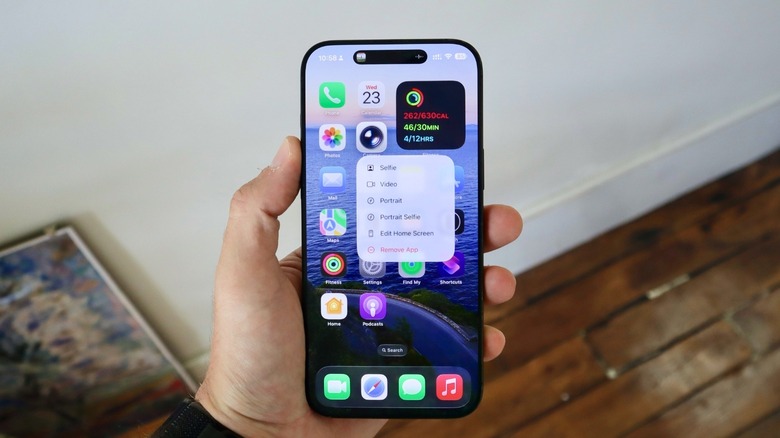 A hand holding an iPhone 16 Pro Max