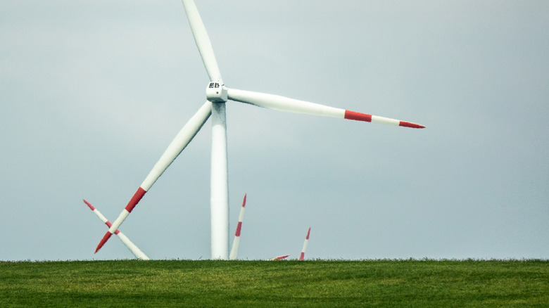 Wind turbine blades painted red.