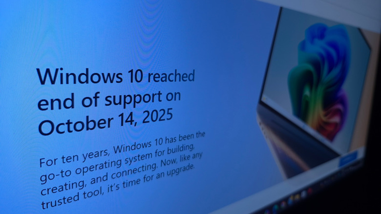 A Windows 10 end of service message displayed on a monitor.