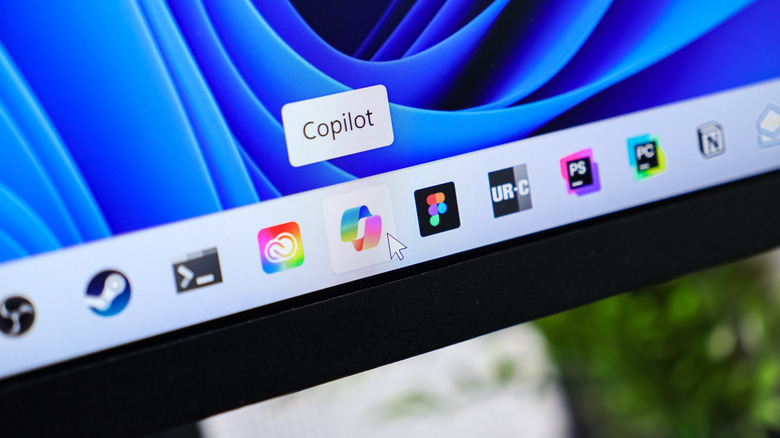 Windows 11 taskbar showing Copilot AI highlighted.