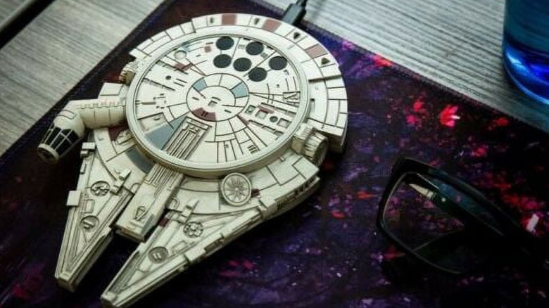 Millenium Falcon wireless charger on table