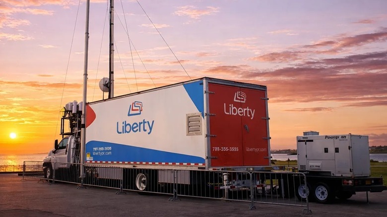 Liberty Cablevision logo on a truck carrying telecom equipment
