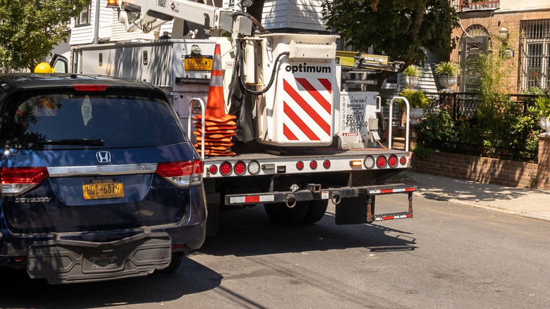 a service truck of Optimum bearing the company logo