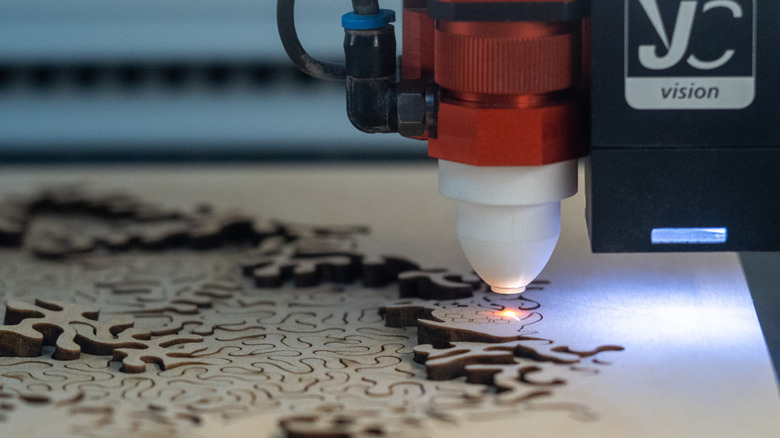 A Laser cutter module on a 3d printer doing precise cuts