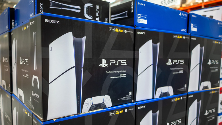 playstation 5 consoles in boxes on display at a store