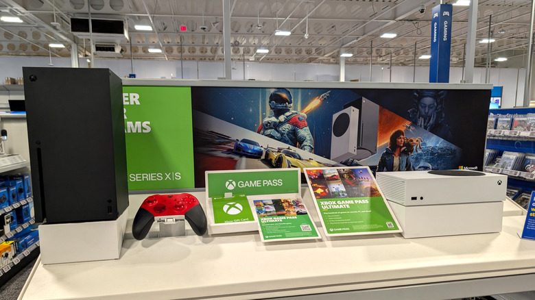 Xbox series x and s consoles on display in a store