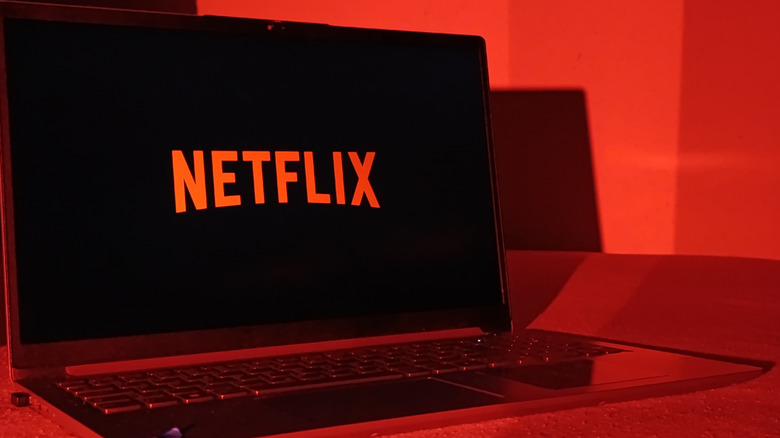 The Netflix logo on a laptop.