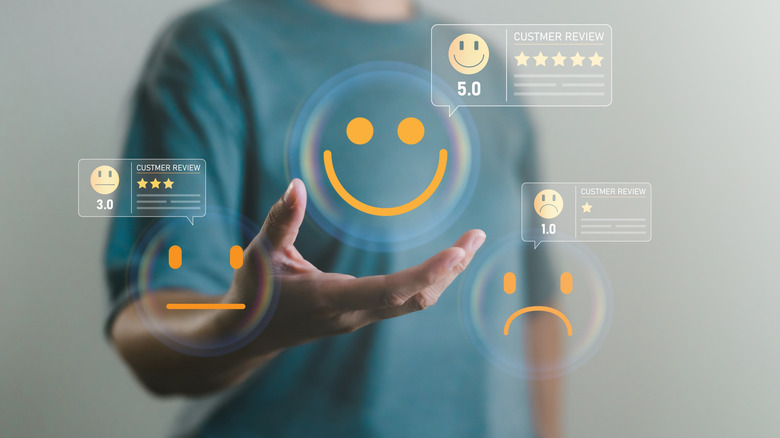 Concept of person selecting different ratings