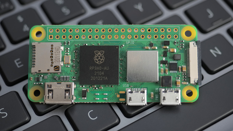 Raspberry Pi Zero 2 W sitting on laptop keyboard