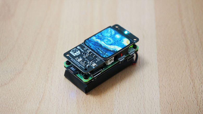 Whisplay-AI-Chatbot device laying on table